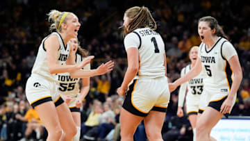 The Iowa Hawkeyes react as Iowa Hawkeyes guard Taylor Stremlow (1) goes to the free throw line Wednesday, Dec. 11, 2024 at Carver-Hawkeye Arena in Iowa City, Iowa.