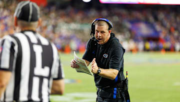  Florida Gators head coach Billy Napier calls a timeout.