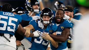 Jacksonville Jaguars place kicker Cam Little (39) is celebrated for his 70-yard field goal by cornerback Jarrian Jones (22) and others during the second quarter of an NFL preseason matchup at EverBank Stadium, Saturday, Aug. 9, 2025 in Jacksonville, Fla. [Corey Perrine/Florida Times-Union]