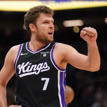 Oct 29, 2023; Sacramento, California, USA; Sacramento Kings forward Sasha Vezenkov (7) pumps his fist after the Kings maintained possession of the ball against the Los Angeles Lakers in the third quarter at the Golden 1 Center. Mandatory Credit: Cary Edmondson-USA TODAY Sports