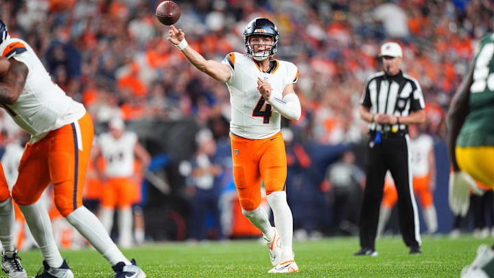 Aug 18, 2024; Denver, Colorado, USA; Denver Broncos quarterback Zach Wilson (4) passes the ball in the second half against the Green Bay Packers at Empower Field at Mile High. Mandatory Credit: Ron Chenoy-Imagn Images