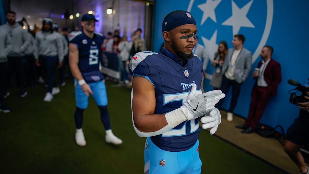 Tennessee Titans running back Tony Pollard (20) prepares to head out to the field before the Titans play the Bengals at Nissan Stadium in Nashville, Tenn., Sunday, Dec. 15, 2024.