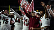 South Carolina Gamecocks head coach Shane Beamer sings the fight song with his team towards the fans after their win against Vanderbilt Commodores at FirstBank Stadium in Nashville, Tenn., Saturday, Nov. 9, 2024.