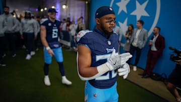 Tennessee Titans running back Tony Pollard (20) prepares to head out to the field before the Titans play the Bengals at Nissan Stadium in Nashville, Tenn., Sunday, Dec. 15, 2024.