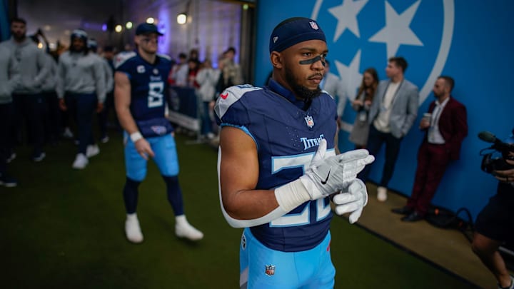 Tennessee Titans running back Tony Pollard (20) prepares to head out to the field before the Titans play the Bengals at Nissan Stadium in Nashville, Tenn., Sunday, Dec. 15, 2024.