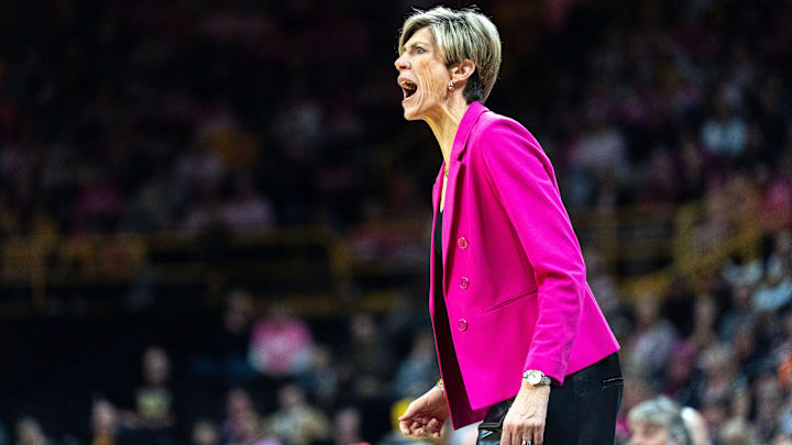 Iowa head coach Jan Jensen reacts during a basketball game against the Washington Huskies Feb. 11, 2026 at Carver-Hawkeye Arena in Iowa City, Iowa.