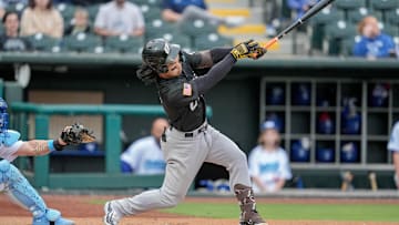El Paso infielder Connor Joe (9) hits a single during the home opener Minor League baseball game between the Oklahoma City Comets and the El Paso Chihuahuas at Chickasaw Bricktown Ballpark in Oklahoma City on Tuesday, April 1, 2025.