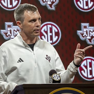 Oct 15, 2025; Birmingham, AL, USA; Texas A&M Aggies head coach Bucky McMillan talks with the media during SEC Media Days at Grand Bohemian Hotel. Mandatory Credit: Vasha Hunt-Imagn Images