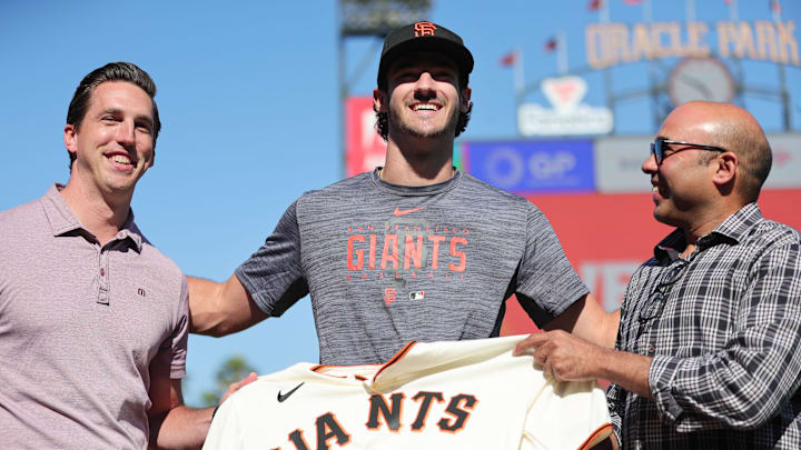 Jul 26, 2023; San Francisco, California, USA; San Francisco Giants general manager Pete Putila, first round draft pick Bryce Eldridge, and president of baseball operations Farhan Zaidi pose for a photo before the game against the Oakland Athletics at Oracle Park. 