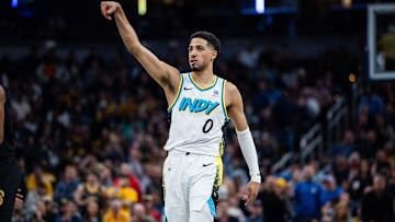 Apr 10, 2025; Indianapolis, Indiana, USA; Indiana Pacers guard Tyrese Haliburton (0) celebrates a made basket in the second half against the Cleveland Cavaliers at Gainbridge Fieldhouse. Mandatory Credit: Trevor Ruszkowski-Imagn Images