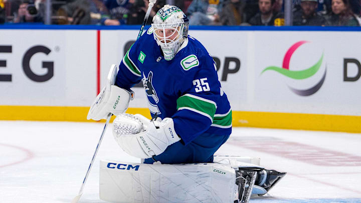 Apr 21, 2024; Vancouver, British Columbia, CAN; Vancouver Canucks goalie Thatcher Demko (35) watches the rebound against the Nashville Predators in game one of the first round of the 2024 Stanley Cup Playoffs at Rogers Arena. Mandatory Credit: Bob Frid-Imagn Images