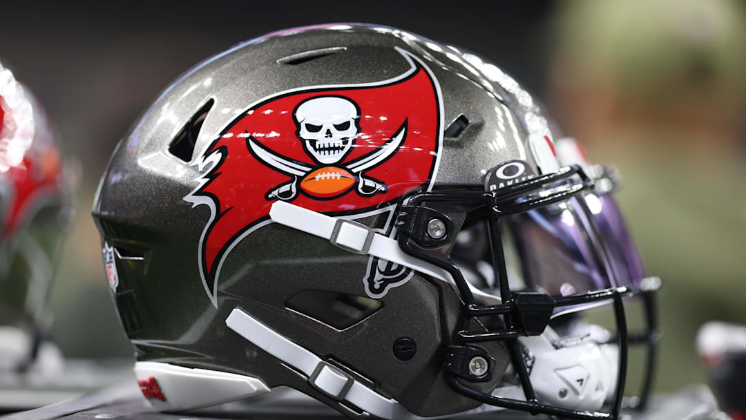 A Tampa Bay Buccaneers helmet is seen on the sidelines prior to a game against the New Orleans Saints 