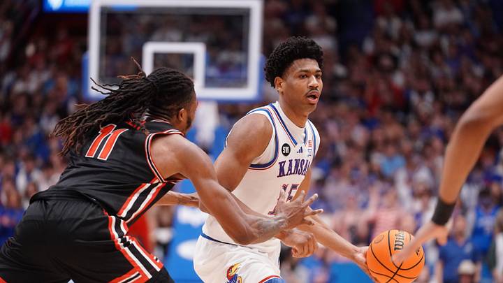 Kansas Jayhawks forward Bryson Tiller (15) looks for a pass against Houston Cougars during the game inside Allen Fieldhouse on Monday, Feb. 23, 2026.