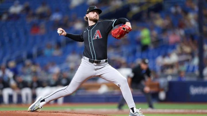 Aug 16, 2024; St. Petersburg, Florida, USA; Arizona Diamondbacks pitcher Ryne Nelson (19) throws a pitch against the Tampa Bay Rays in the first inning at Tropicana Field. Mandatory Credit: Nathan Ray Seebeck-USA TODAY Sports