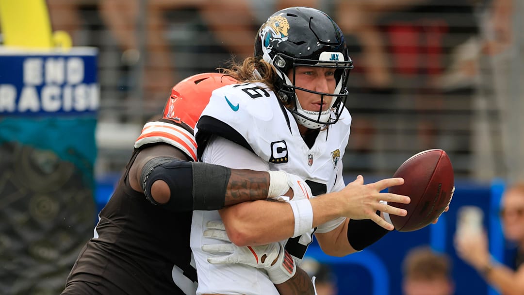 Cleveland Browns defensive end Alex Wright (91) sacks Jacksonville Jaguars quarterback Trevor Lawrence (16) in the end zone for a safety during the fourth quarter of an NFL football matchup Sunday, Sept. 15, 2024 at EverBank Stadium in Jacksonville, Fla. The Browns defeated the Jaguars 18-13. [Corey Perrine/Florida Times-Union]