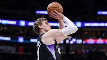 Mar 14, 2025; Salt Lake City, Utah, USA;  Utah Jazz forward Lauri Markkanen (23) shoots a three point basket during the first quarter against the Toronto Raptors at Delta Center. Mandatory Credit: Chris Nicoll-Imagn Images