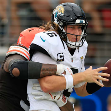 Cleveland Browns defensive end Alex Wright (91) sacks Jacksonville Jaguars quarterback Trevor Lawrence (16) in the end zone for a safety during the fourth quarter of an NFL football matchup Sunday, Sept. 15, 2024 at EverBank Stadium in Jacksonville, Fla. The Browns defeated the Jaguars 18-13. [Corey Perrine/Florida Times-Union]