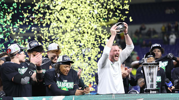 Oregon Ducks head coach Dan Lanning and the Oregon Ducks celebrate defeating the Penn State Nittany Lions to win the Big Ten