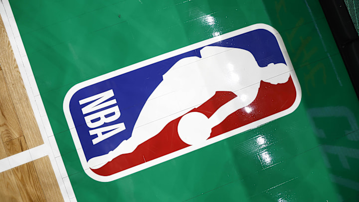 The NBA logo is seen on the court before the game between the Boston Celtics and the Portland Trail Blazers.