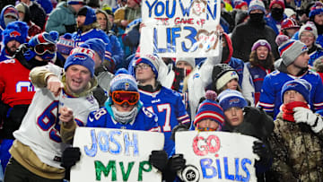 Buffalo Bills fans cheer during the Buffalo Bills vs Baltimore Ravens in a 2025 AFC divisional round game at Highmark Stadium. 