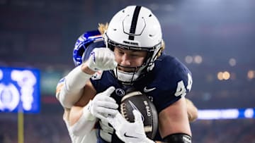 Penn State Nittany Lions tight end Tyler Warren (44) catches a touchdown pass against the Boise State Broncos in the Fiesta Bowl at State Farm Stadium. 