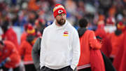 Jan 5, 2025; Denver, Colorado, USA; Kansas City Chiefs tight end Travis Kelce (87) walks the sidelines in the second half against the Denver Broncos at Empower Field at Mile High. 