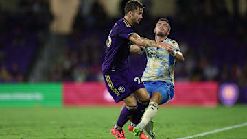 Oct 2, 2024; Orlando, Florida, USA; Orlando City defender Michael Halliday (26) and Philadelphia Union defender Kai Wagner (27) collide in the second half at Inter&Co Stadium. Mandatory Credit: Nathan Ray Seebeck-Imagn Images