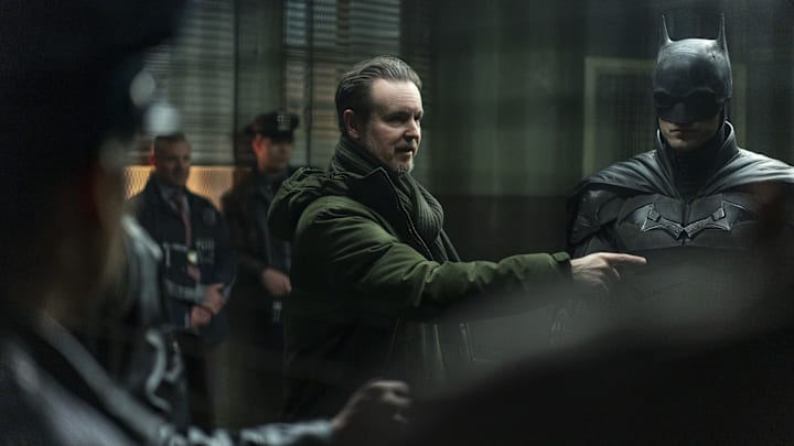 (L-r) Director MATT REEVES and ROBERT PATTINSON on the set in Warner Bros. Pictures’ action adventure “THE BATMAN,” a Warner Bros. Pictures release. Photo: Jonathan Olley/™ & © DC Comics. © 2021 Warner Bros. Entertainment Inc. All Rights Reserved.