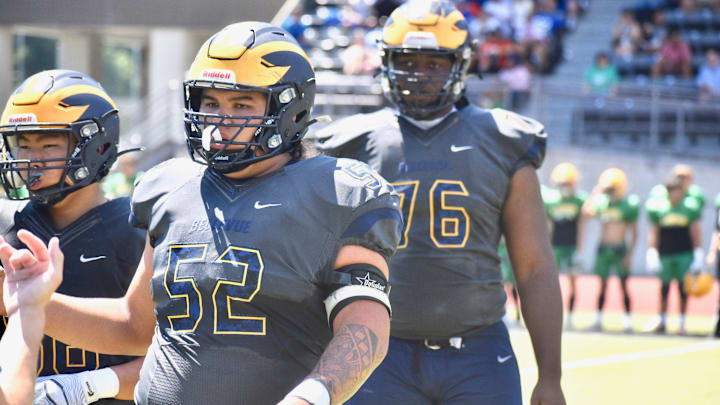 Bellevue's Willi Wascher, left, and Demetri Manning, were back together along dominant offense line in Wolverines' Class 3A quarterfinal win over Kennewick.