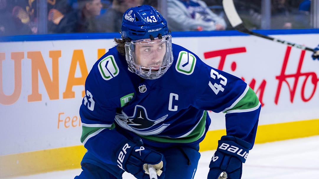 Dec 14, 2024; Vancouver, British Columbia, CAN; Vancouver Canucks defenseman Quinn Hughes (43) skates against the Boston Bruins during the third period at Rogers Arena. Mandatory Credit: Bob Frid-Imagn Images