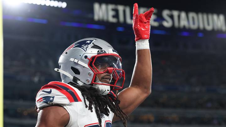Aug 21, 2025; East Rutherford, New Jersey, USA; New England Patriots safety Kyle Dugger (23) reacts after intercepting a pass during the first half against the New York Giants at MetLife Stadium. Mandatory Credit: Vincent Carchietta-Imagn Images
