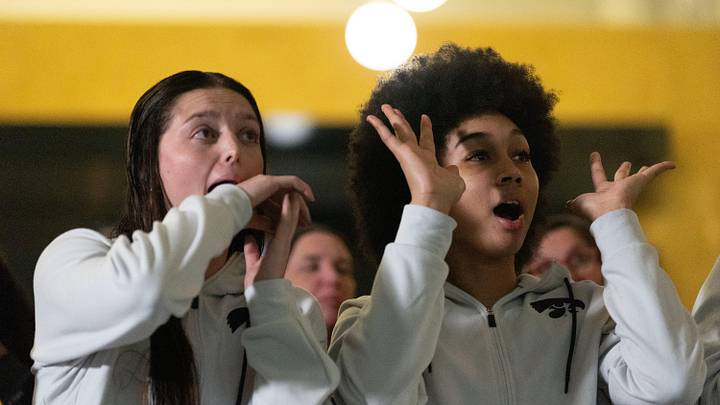 Iowa guard Taylor McCabe and Iowa forward Hannah Stuelke react during a watch party for the NCAA Tournament bracket reveal March 15, 2026 at Carver-Hawkeye Arena in Iowa City, Iowa.