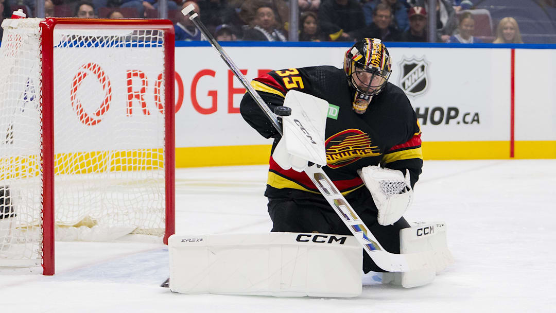 Feb 15, 2024; Vancouver, British Columbia, CAN; Vancouver Canucks goalie Thatcher Demko (35) makes a save against the Detroit Red Wings in the second period at Rogers Arena. Mandatory Credit: Bob Frid-Imagn Images