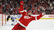 Oct 17, 2025; Detroit, Michigan, USA; Detroit Red Wings center Dylan Larkin (71) scores the game winning goal in overtime against Tampa Bay Lightning goaltender Andrei Vasilevskiy (88) at Little Caesars Arena. Mandatory Credit: Brian Bradshaw Sevald-Imagn Images