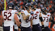 Nov 2, 2025; Cincinnati, Ohio, USA; Chicago Bears tight end Colston Loveland (84) celebrates with guard Joe Thuney (62), center Drew Dalman (52) and guard Jonah Jackson (73) after scoring a touchdown against the Cincinnati Bengals during the fourth quarter at Paycor Stadium.  