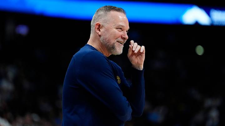 Mar 28, 2025; Denver, Colorado, USA; Denver Nuggets head coach Michael Malone  reacts in the second half against the Utah Jazz at Ball Arena. Mandatory Credit: Ron Chenoy-Imagn Images
