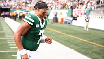 Sep 7, 2025; East Rutherford, New Jersey, USA; New York Jets quarterback Justin Fields (7) walks off the field after losing to the Pittsburgh Steelers at MetLife Stadium. Mandatory Credit: Wendell Cruz-Imagn Images