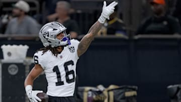 Dec 29, 2024; New Orleans, Louisiana, USA; Las Vegas Raiders wide receiver Jakobi Meyers (16) signals a first down against the New Orleans Saints at Caesars Superdome. Mandatory Credit: Matthew Hinton-Imagn Images