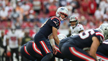 Nov 9, 2025; Tampa, Florida, USA; New England Patriots quarterback Drake Maye (10) under center during the fourth quarter against the Tampa Bay Buccaneers at Raymond James Stadium. Mandatory Credit: Nathan Ray Seebeck-Imagn Images