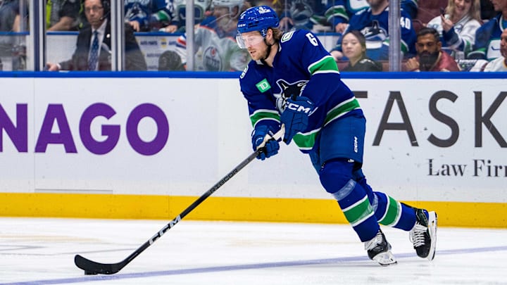 May 16, 2024; Vancouver, British Columbia, CAN; Vancouver Canucks forward Brock Boeser (6) handles the puck against the Edmonton Oilers during the second period in game five of the second round of the 2024 Stanley Cup Playoffs at Rogers Arena. Mandatory Credit: Bob Frid-Imagn Images