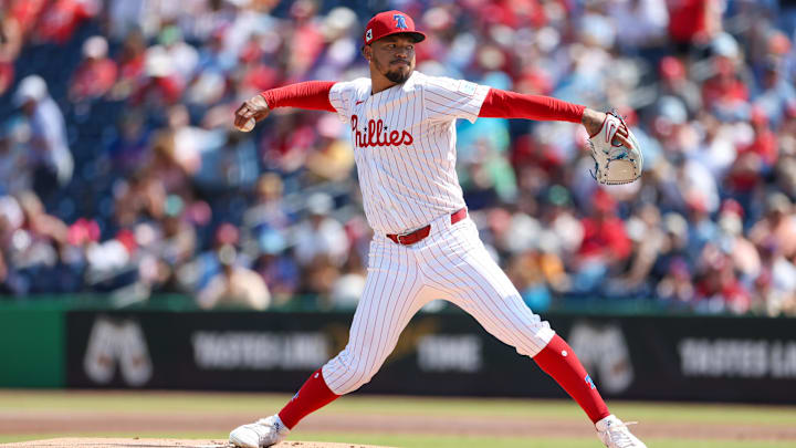 Mar 8, 2025; Clearwater, Florida, USA; Philadelphia Phillies pitcher Taijuan Walker (99) throws a pitch against the Toronto Blue Jays in the first inning during spring training at BayCare Ballpark.
