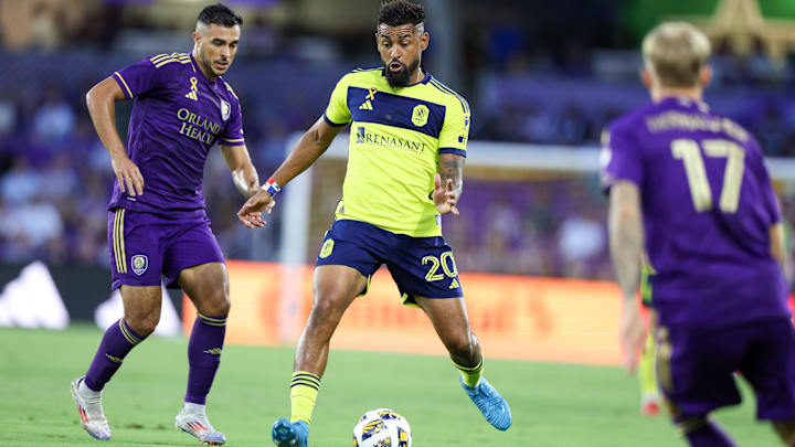 Aug 31, 2024; Orlando, Florida, USA; Nashville SC midfielder Anibal Godoy (20) controls the ball against Orlando City in the first half at Inter&Co Stadium. Mandatory Credit: Nathan Ray Seebeck-Imagn Images