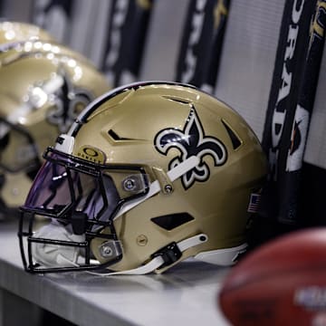 Nov 5, 2023; New Orleans, Louisiana, USA;  Detailed view of the New Orleans Saints helmets on the team bench against the Chicago Bears during the first half at the Caesars Superdome. Mandatory Credit: Stephen Lew-Imagn Images