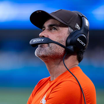 Aug 8, 2025; Charlotte, North Carolina, USA; Cleveland Browns head coach Kevin Stefanski looks at the scoreboard during the second quarter against the Carolina Panthers at Bank of America Stadium. Mandatory Credit: Scott Kinser-The USAToday Network via Imagn Images 