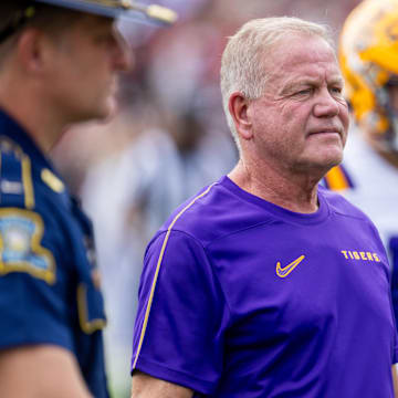 Sep 14, 2024; Columbia, South Carolina, USA; LSU Tigers head coach Brian Kelly walks off the field after warms against the South Carolina Gamecocks at Williams-Brice Stadium. Mandatory Credit: Scott Kinser-Imagn Images