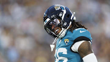 Aug 9, 2025; Jacksonville, Florida, USA; Jacksonville Jaguars safety Antonio Johnson (26) celebrates a tackle against the Pittsburgh Steelers during the second quarter at EverBank Stadium. Mandatory Credit: Morgan Tencza-Imagn Images
