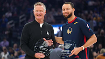 Golden State Warriors head coach Steve Kerr and guard Stephen Curry.