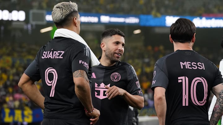 Jan 18, 2025; Las Vegas, Nevada, USA; Inter Miami CF forward Luis Suarez (9), Inter Miami CF defender Jordi Alba (18), and Inter Miami CF forward Lionel Messi (10) talk at the end of regulation against Club America at Allegiant Stadium. Jan 18, 2025; Las Vegas, Nevada, USA; Inter Miami CF forward Luis Suarez (9), Inter Miami CF defender Jordi Alba (18), and Inter Miami CF forward Lionel Messi (10) talk at the end of regulation against Club America at Allegiant Stadium.