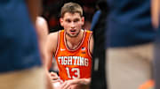 Nov 28, 2024; Kansas City, Missouri, USA; Illinois Fighting Illini center Tomislav Ivisic (13) during a time out against the Arkansas Razorbacks during the first half at T-Mobile Center. Mandatory Credit: William Purnell-Imagn Images