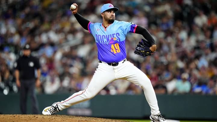 Jun 19, 2026; Denver, Colorado, USA; Colorado Rockies relief pitcher Antonio Senzatela (49) delivers a pitch in the ninth inning against the Pittsburgh Pirates at Coors Field. Mandatory Credit: Ron Chenoy-Imagn Images